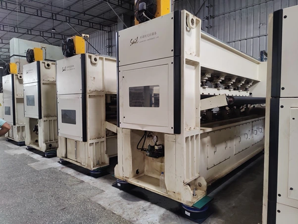 Non Woven Looms Installed on Dynemech Spring Viscous Dampers